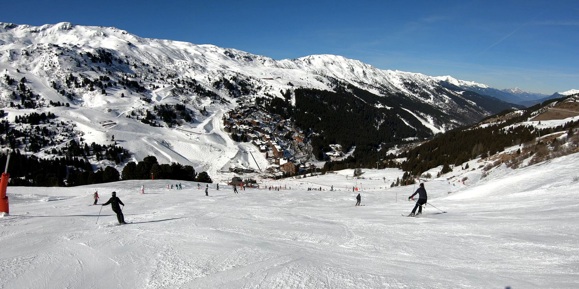 skiers on the slopes at Méribel in winter
				        