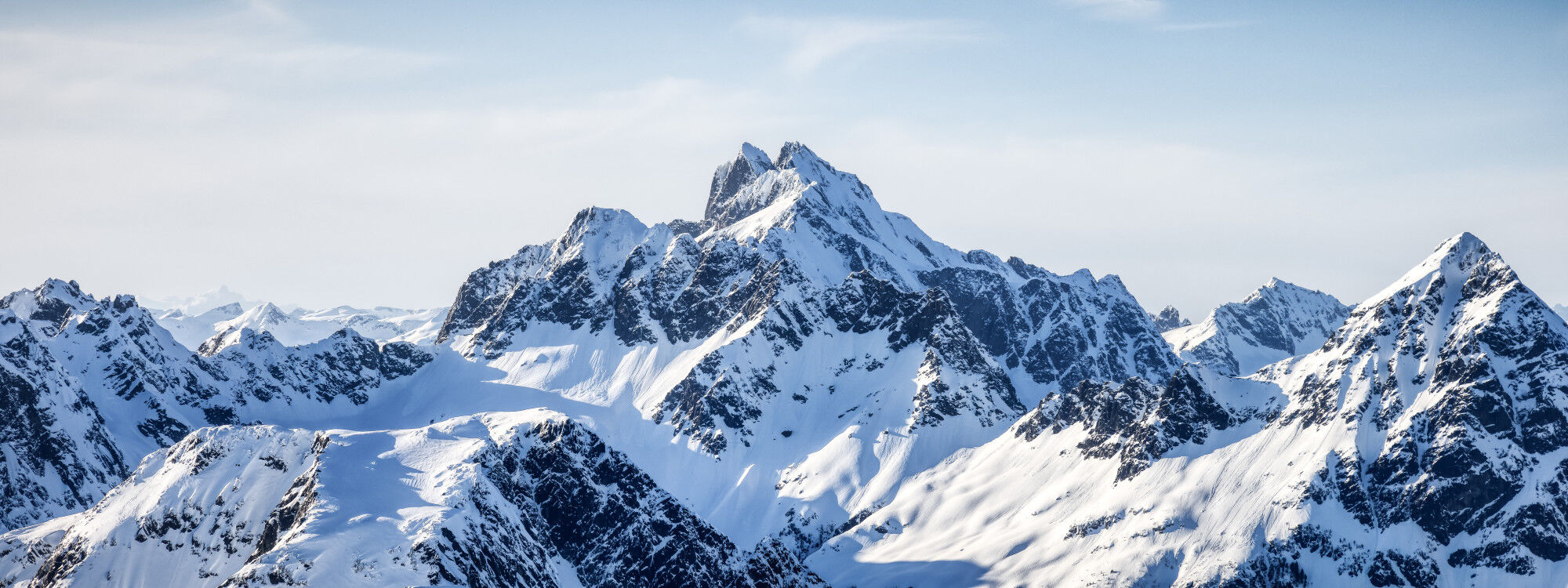 Rocky mountain with snow in Canada aerial view
