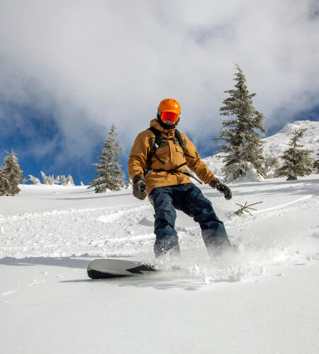 snowboarder on the slopes
		                        