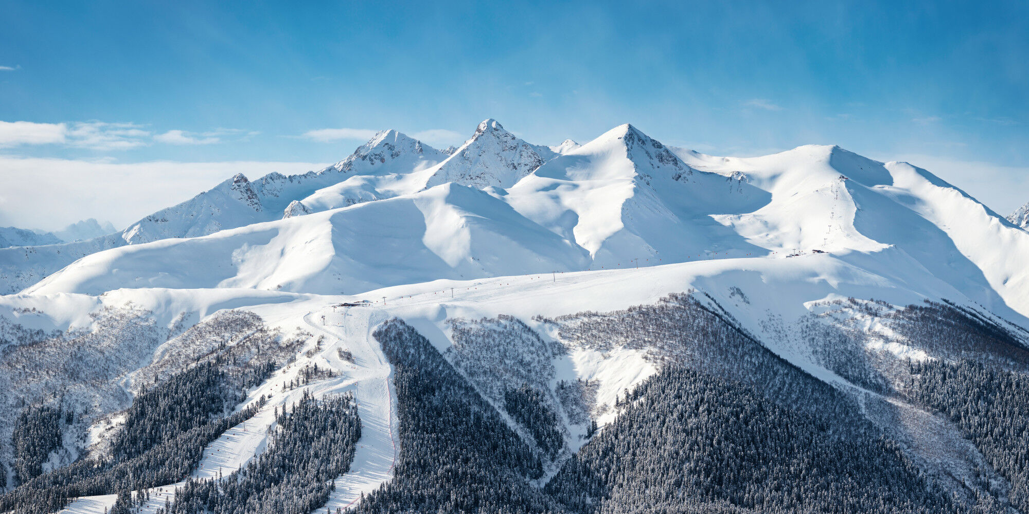snow-covered mountain with slopes
				        