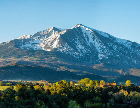 Summer mountains and snow-capped peaks
					        