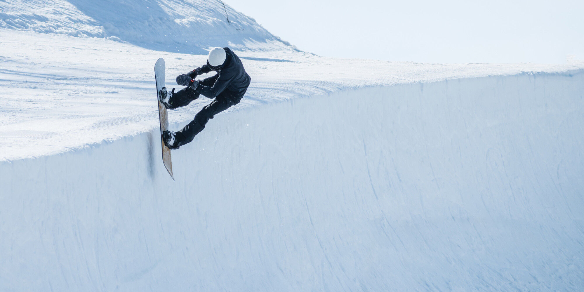 snowboarder in the snow
				        